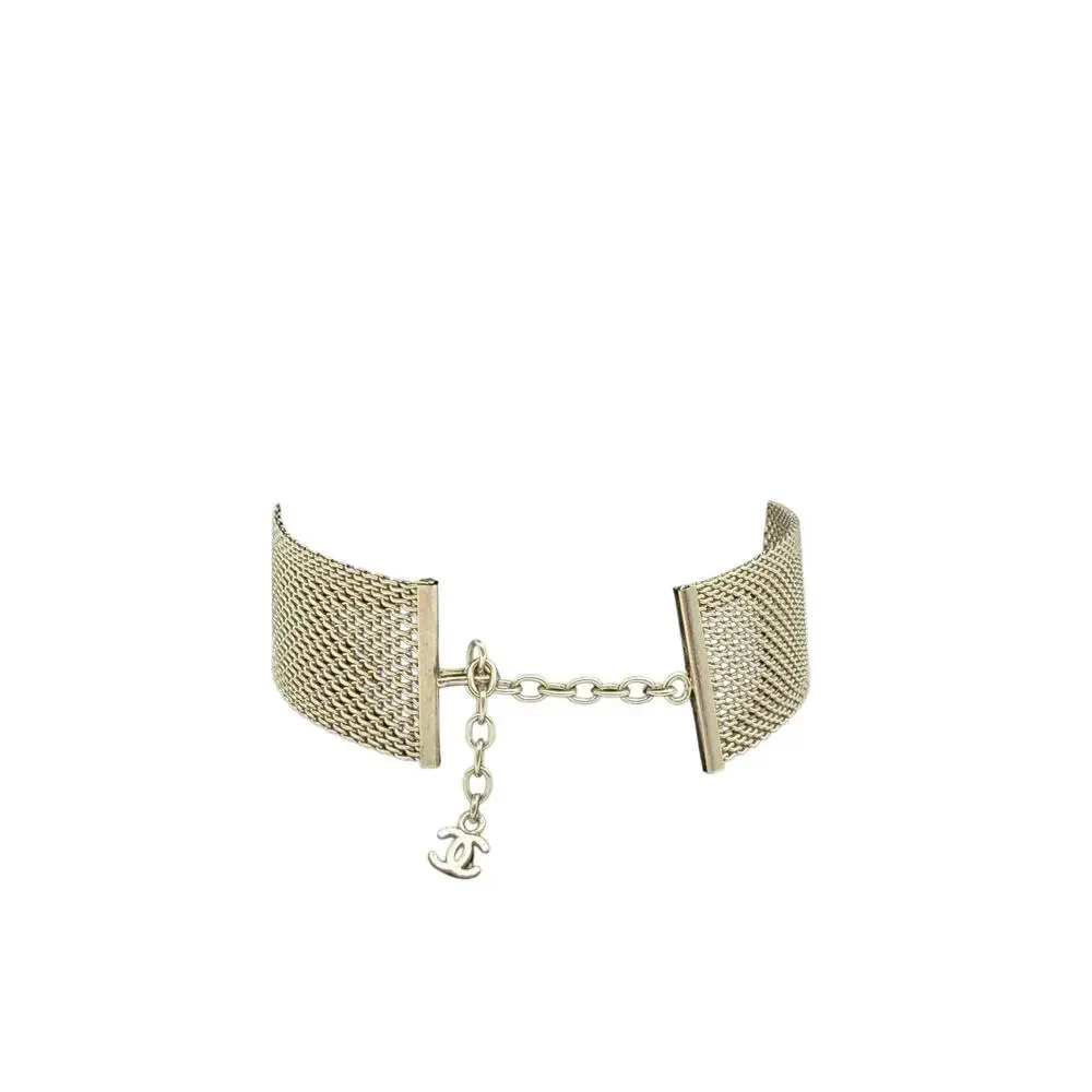 CHANEL Camellia with mesh silver choker collar.